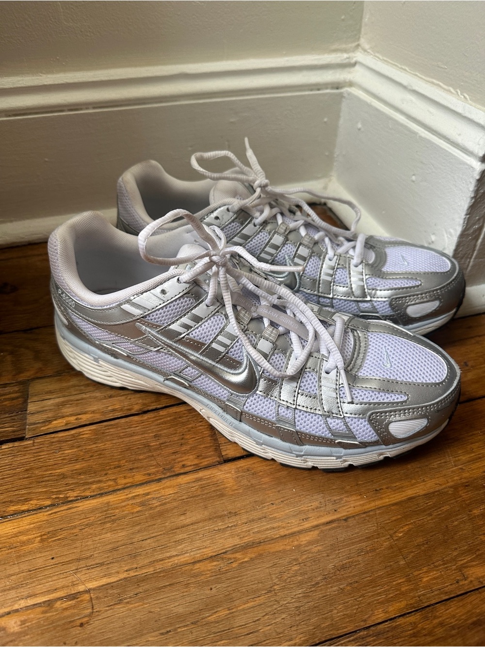 Nike p-6000 Men's 10.5 Womens 12 White and Silver  Running Sneakers
